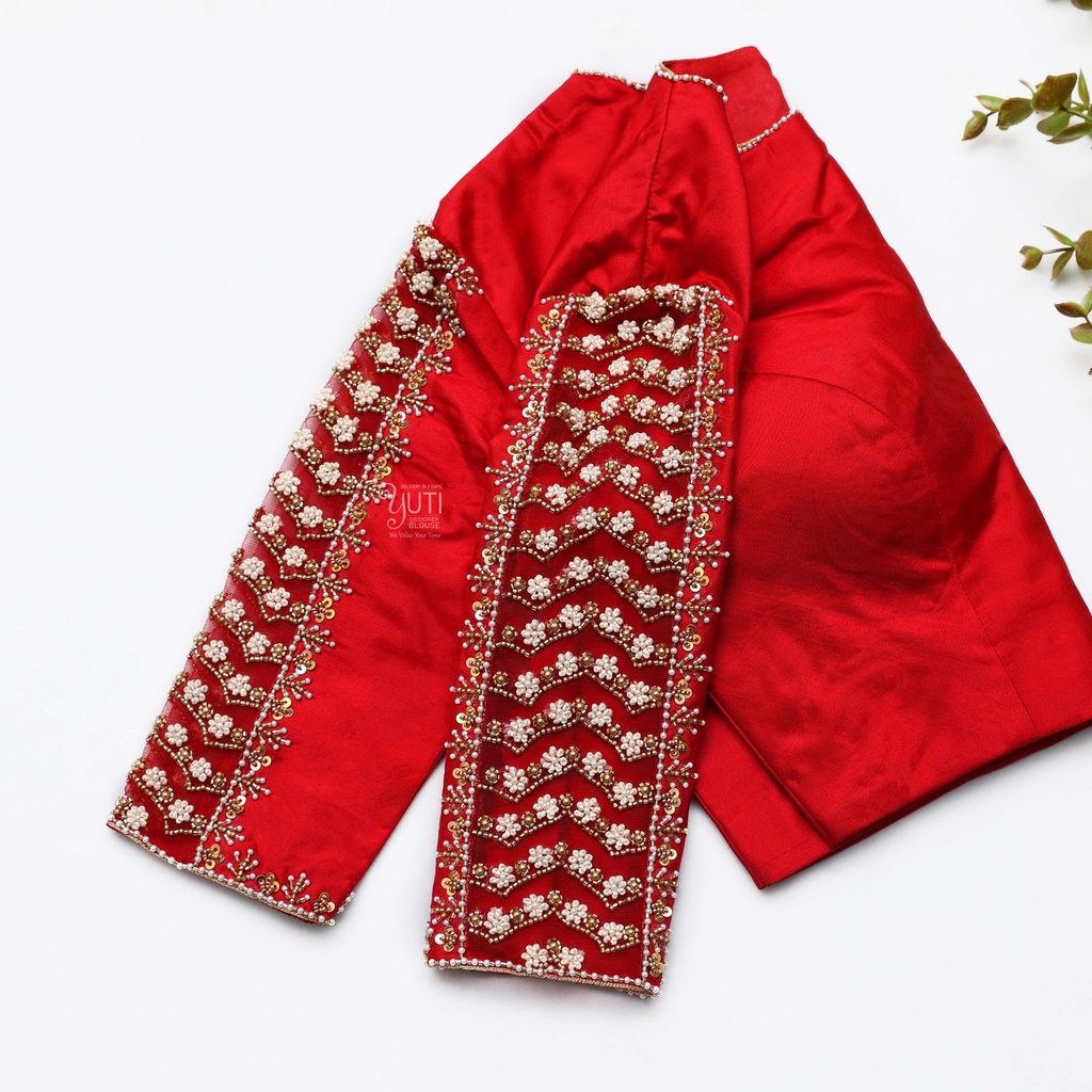 A stunning bridal blouse adorned with intricate embroidery Stitching