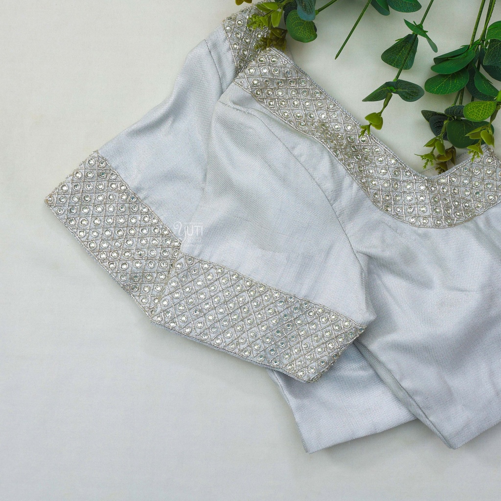 Adding a touch of elegant sophistication to this lace bodice with our new Metallic Silver embroidery. Stitching