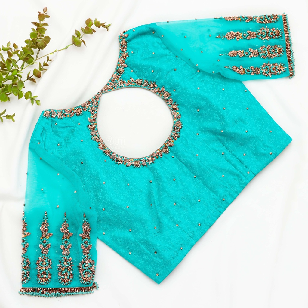 Ca Loving this blue blouse and the cute plant companion Stitching