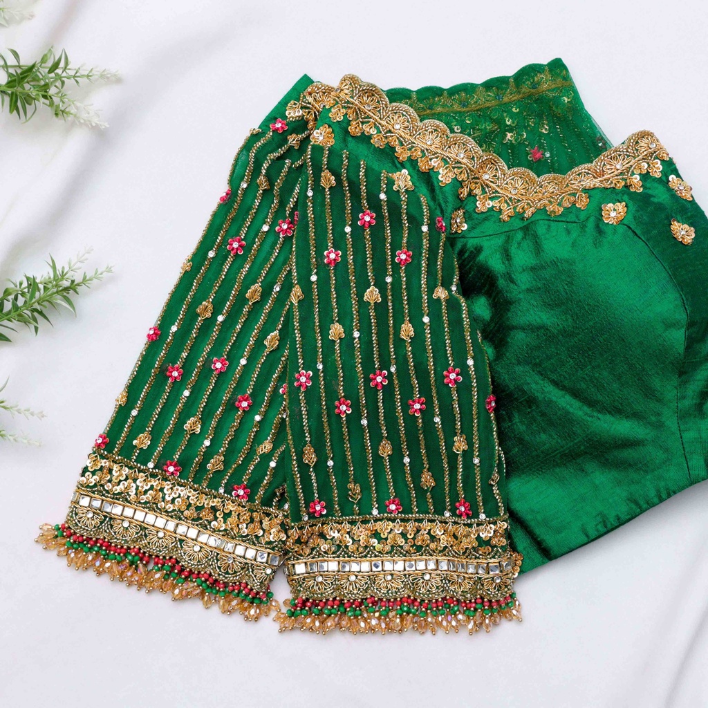 Crafted with intricate lace details and delicate beading, this blouse exudes elegance and sophistication. Stitching