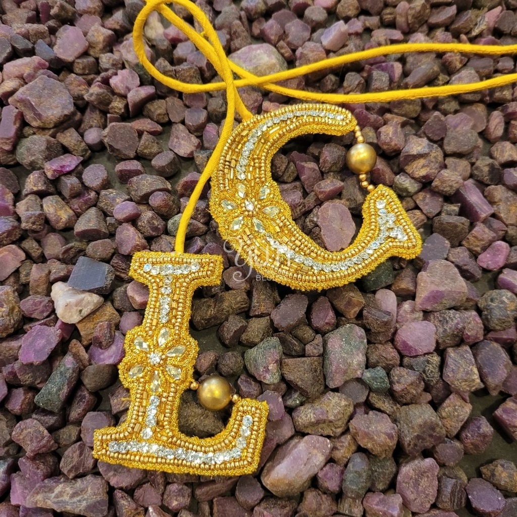 Golden Initial Tassel Stitching