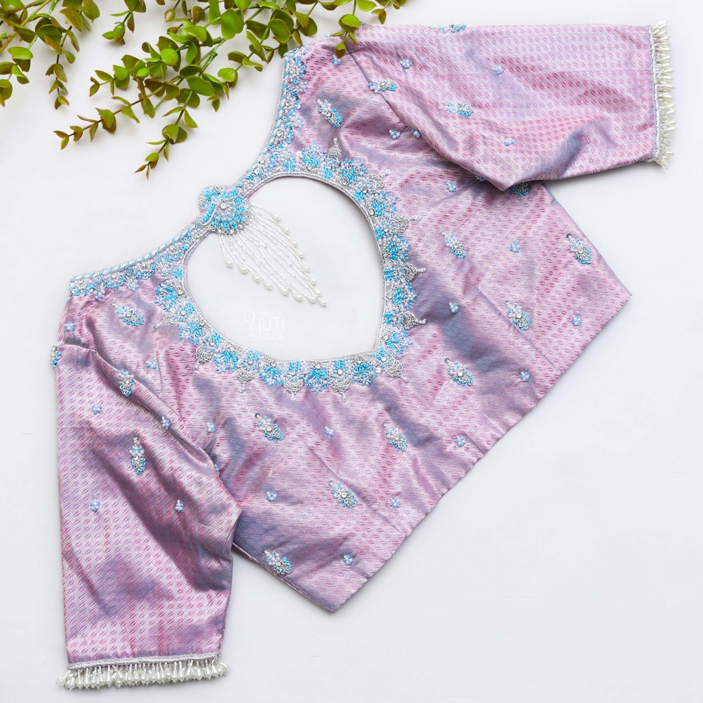 Discover the epitome of grace and style with this French Grey-inspired pink blouse Stitching