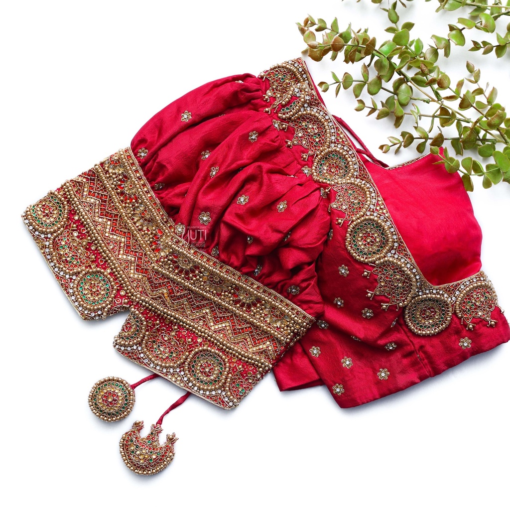 Dress up your style with our stunning Red Pink embroidery blouse Stitching