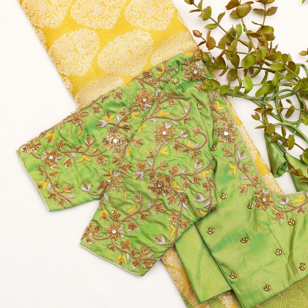 Elevate your style with our Greenish Beige embroidery blouse, the epitome of timeless elegance. Stitching