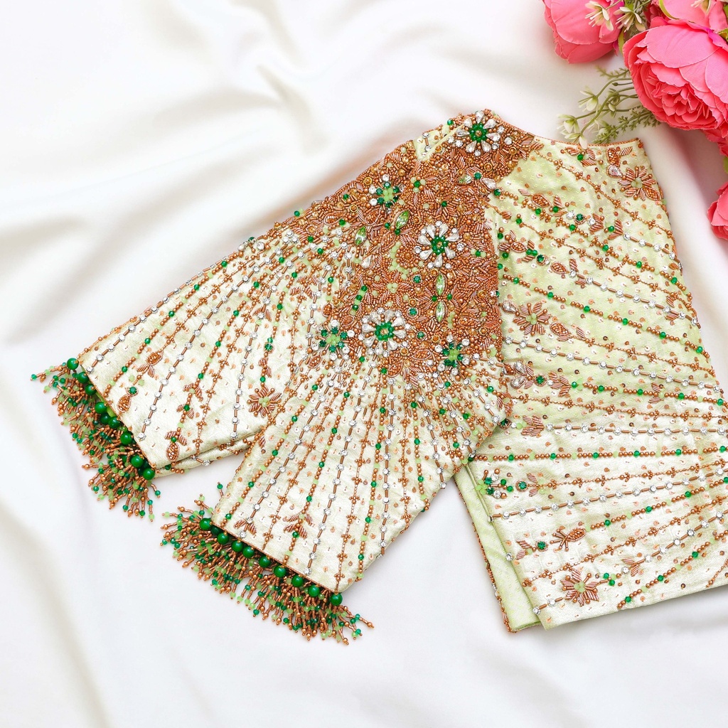 Elevate your style with this stunning Off White embroidery blouse! Stitching