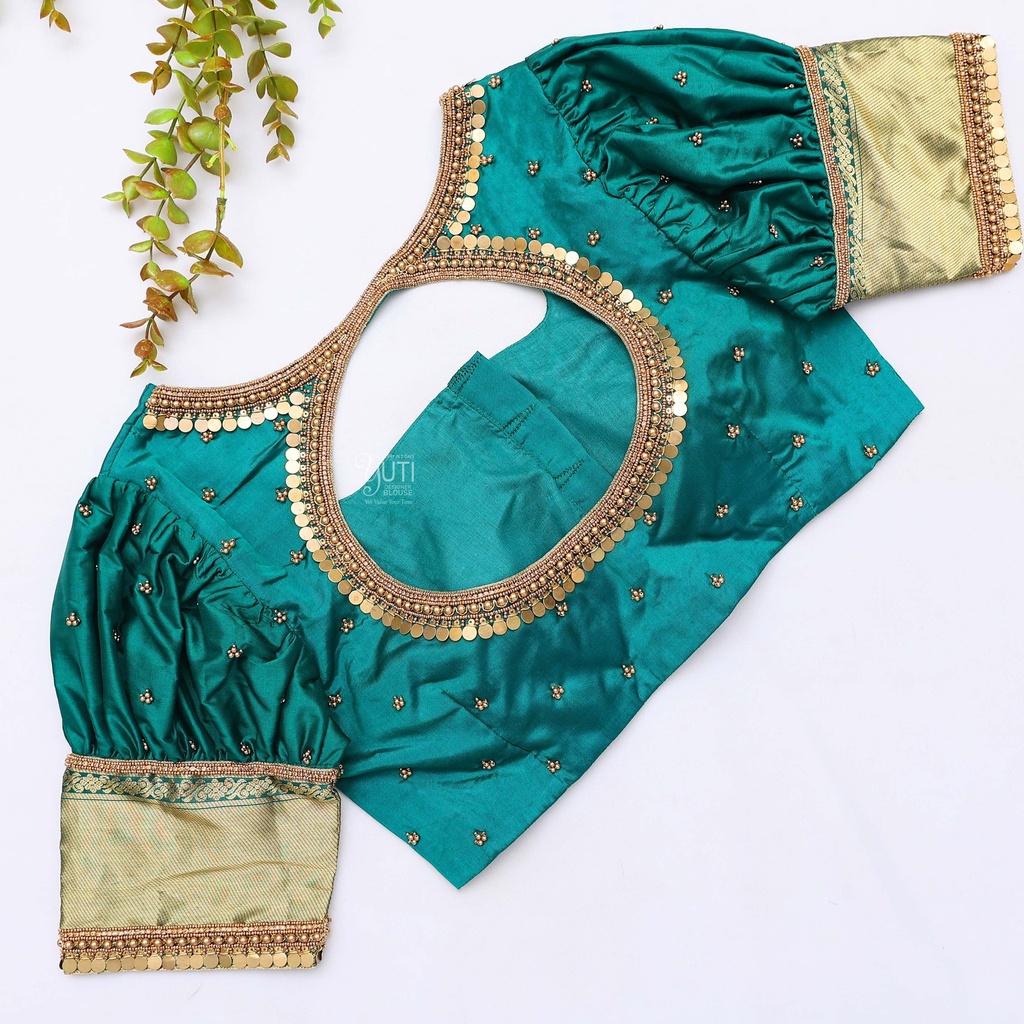 Embodying timeless elegance in this stunning Persian Green Bridal Blouse Stitching