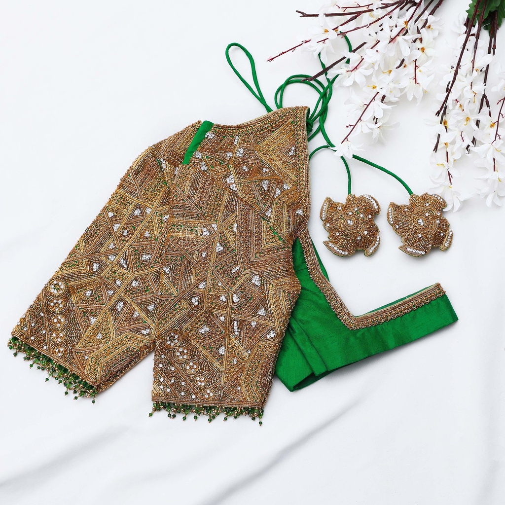 Embroidered meticulously by skilled artisans, every detail on this blouse tells a story of craftsmanship and artistry. Stitching