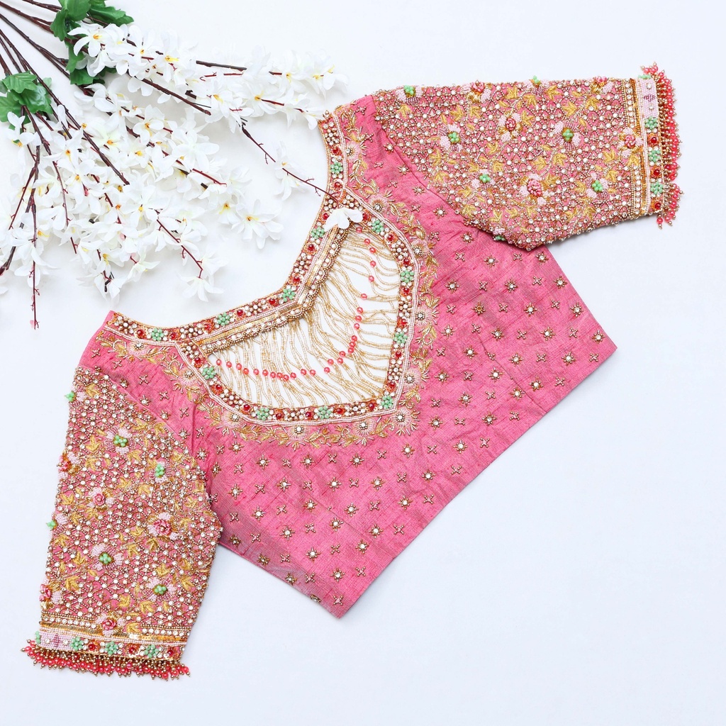 Feeling pretty in this light pink designer blouse Stitching