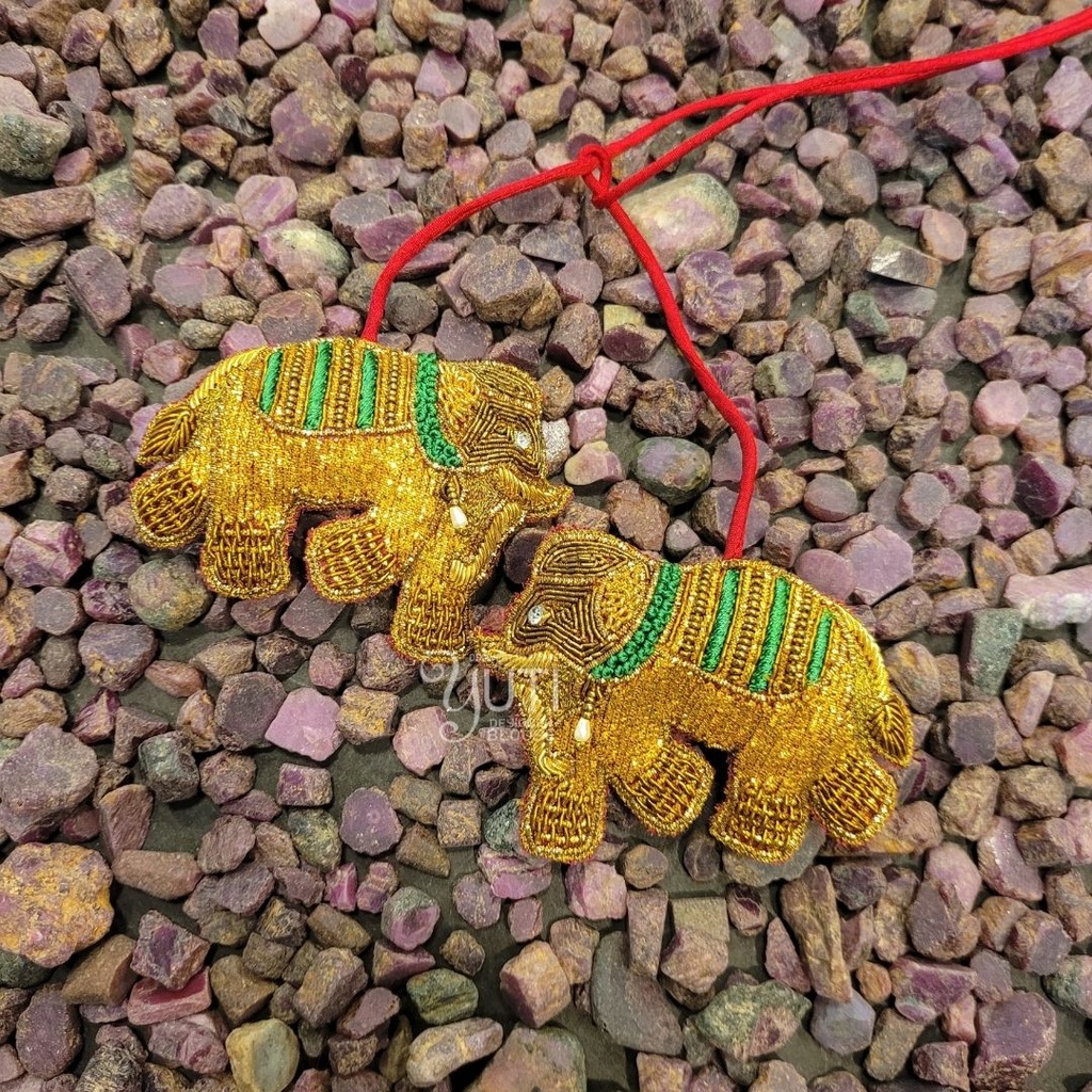 Gold elephant tassel Stitching