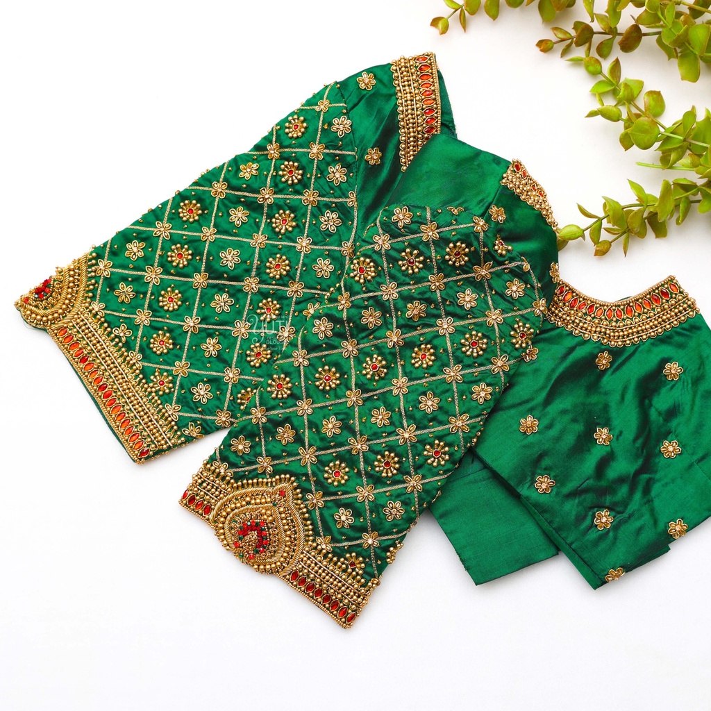 Indulge in the rich beauty of our Dark Green embroidery blouse. Stitching