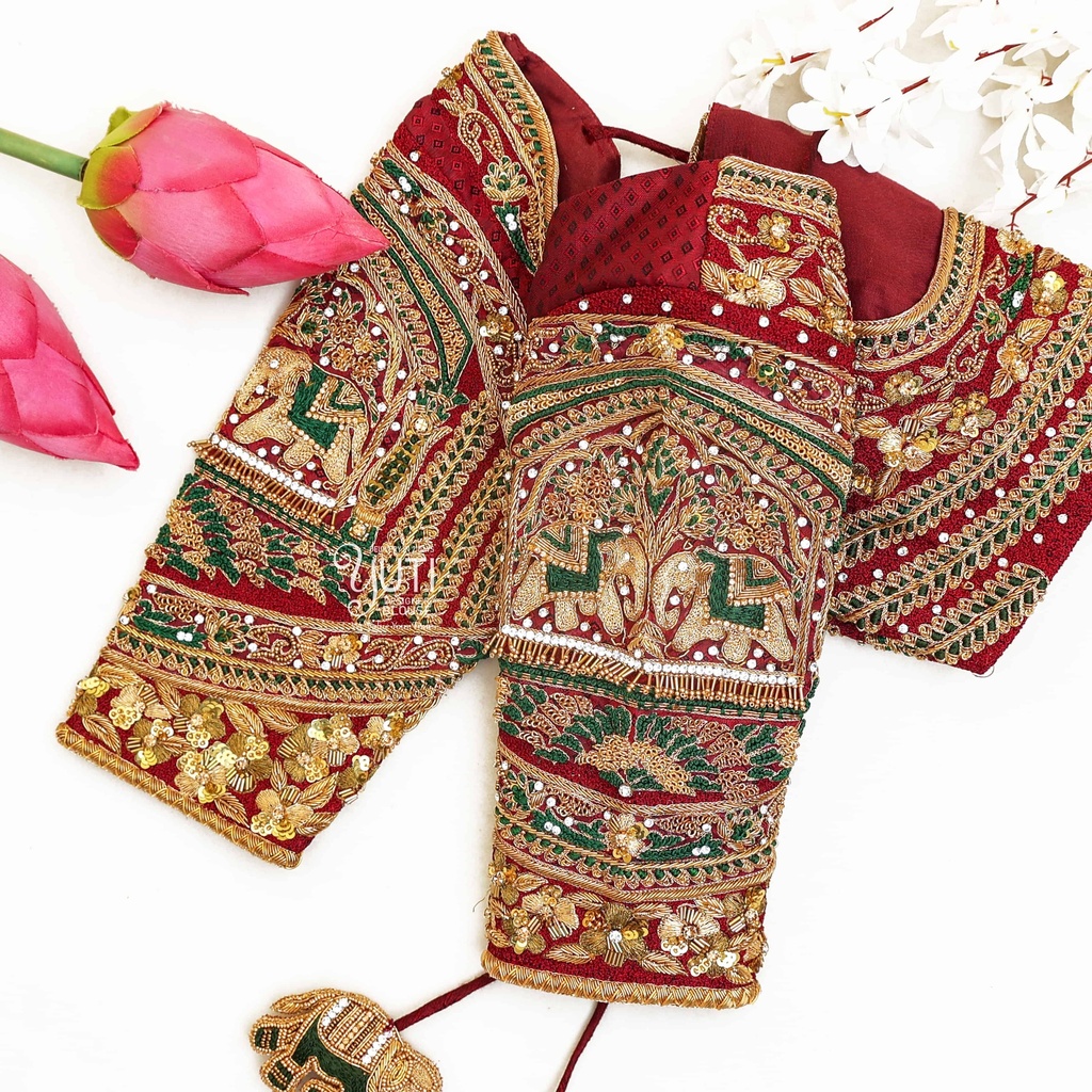 Maroon floral and elephant bridal blouse Stitching