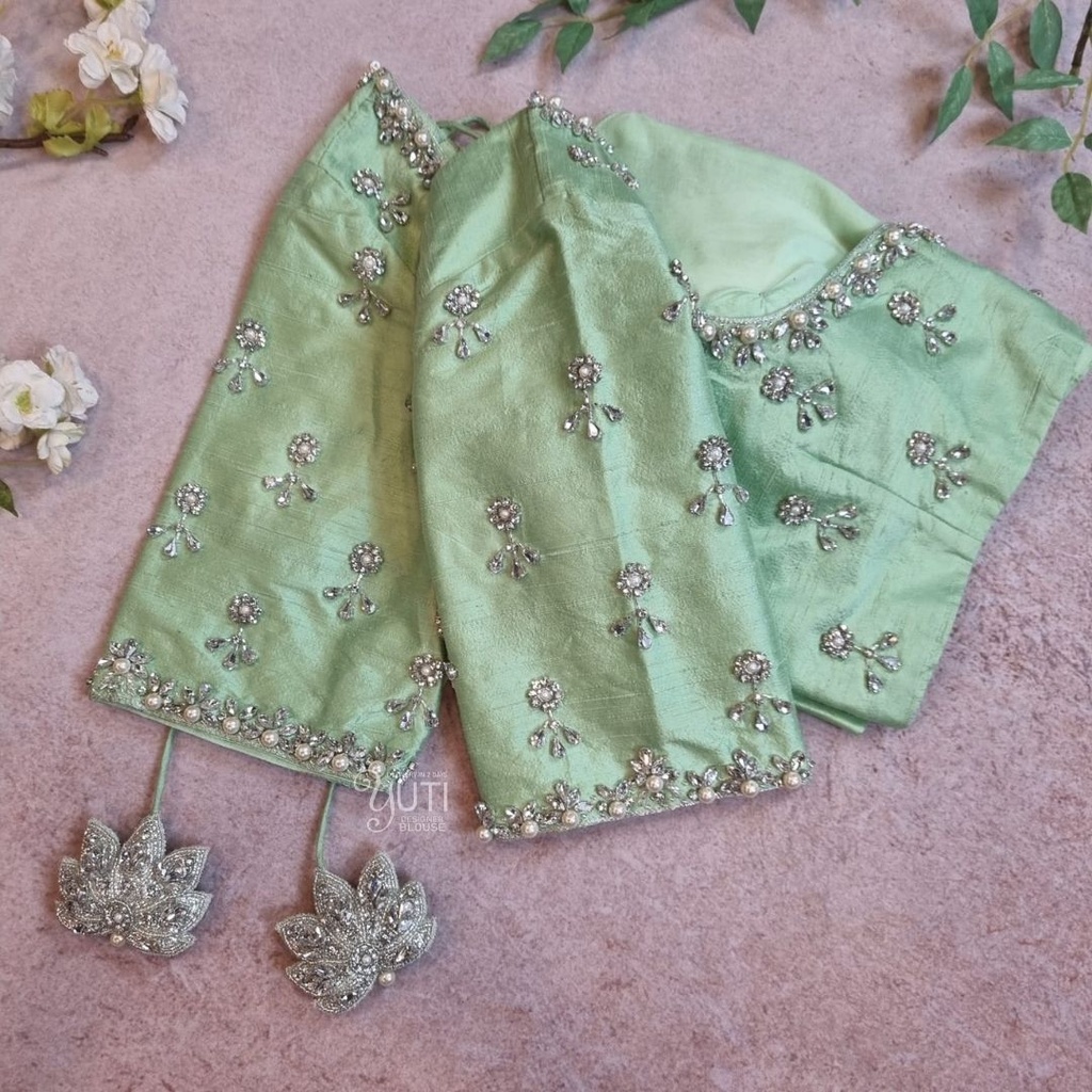 Pastel green floral motifs design  Stitching