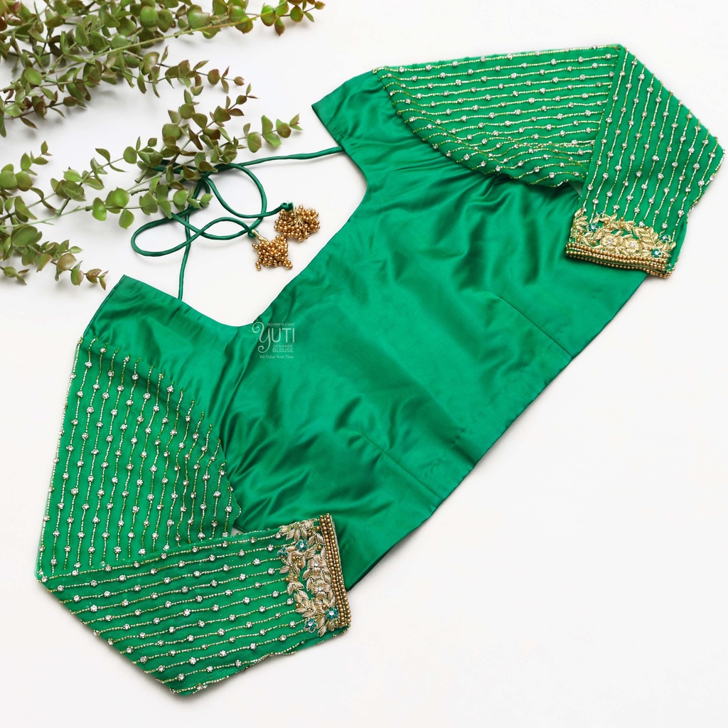 Step up your fashion game with this stunning green blouse Stitching
