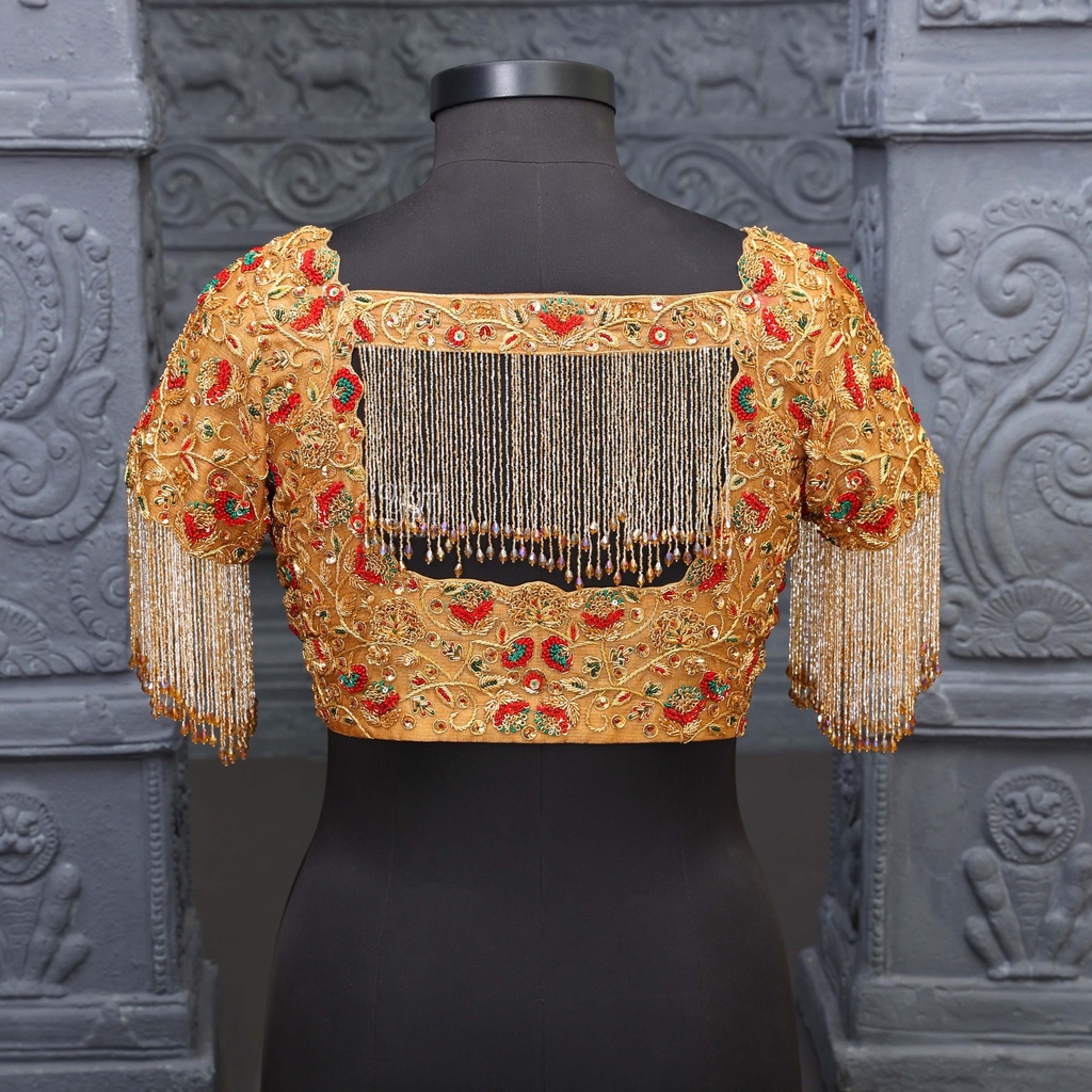 Stunning gold and red blouse. Stitching
