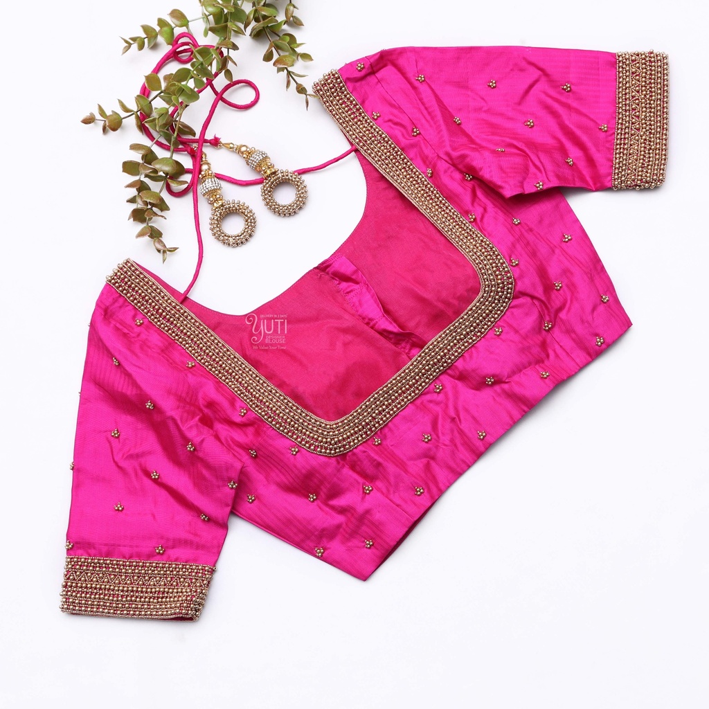 Stunning pink blouse with its exquisite gold embroidery Stitching