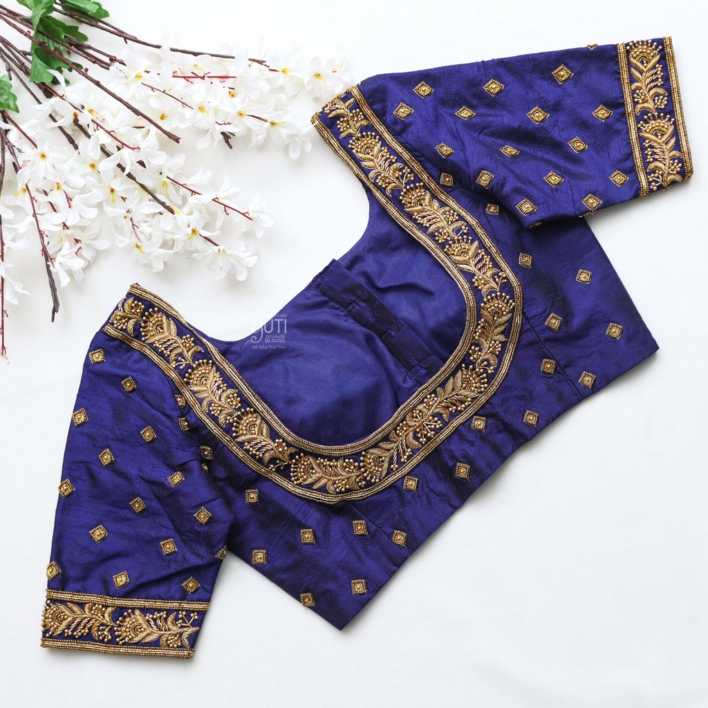 The perfect dark blue bridal blouse with stunning golden embroidery work Stitching
