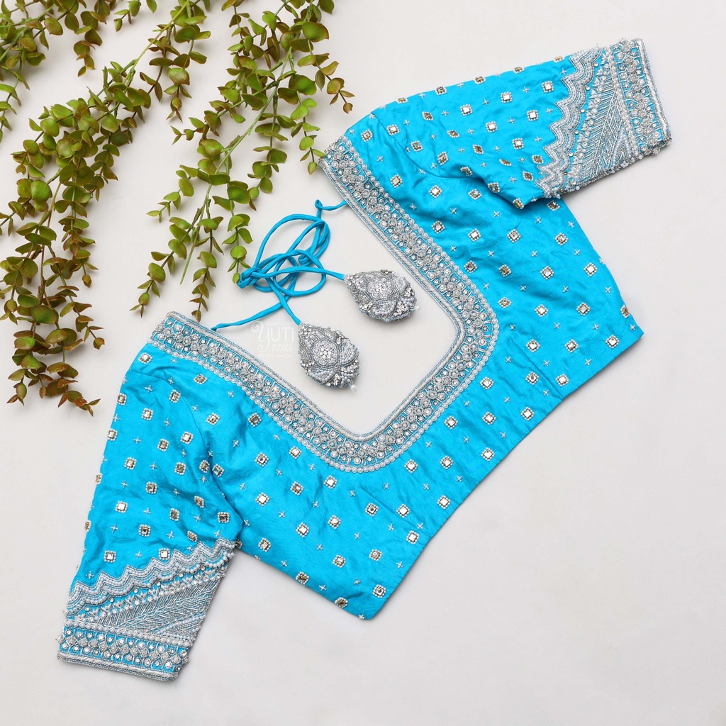 This stunning neon blue designer blouse Stitching