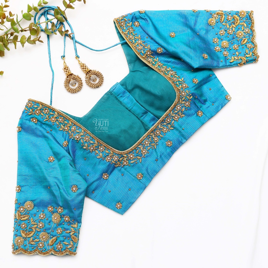 Traditional craftsmanship with this exquisite blue blouse Stitching