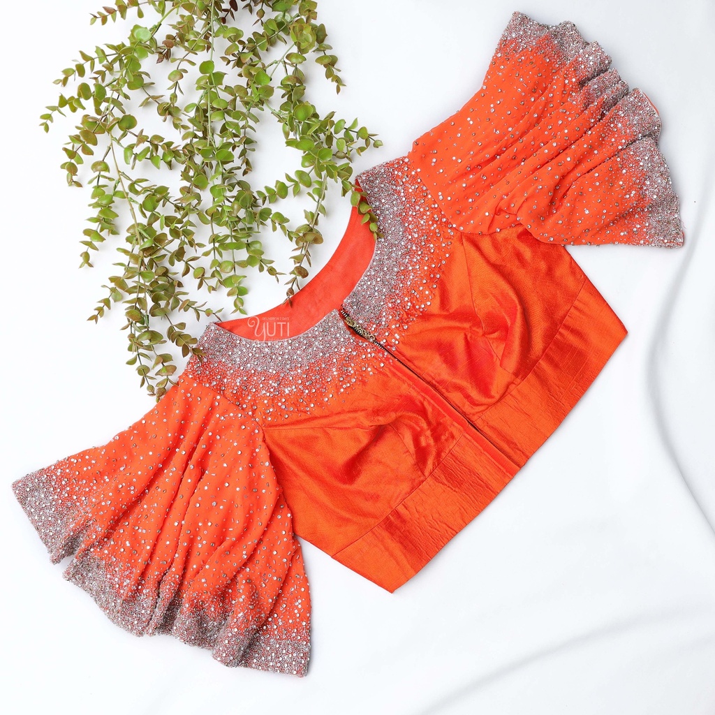Vibrant orange blouse Stitching