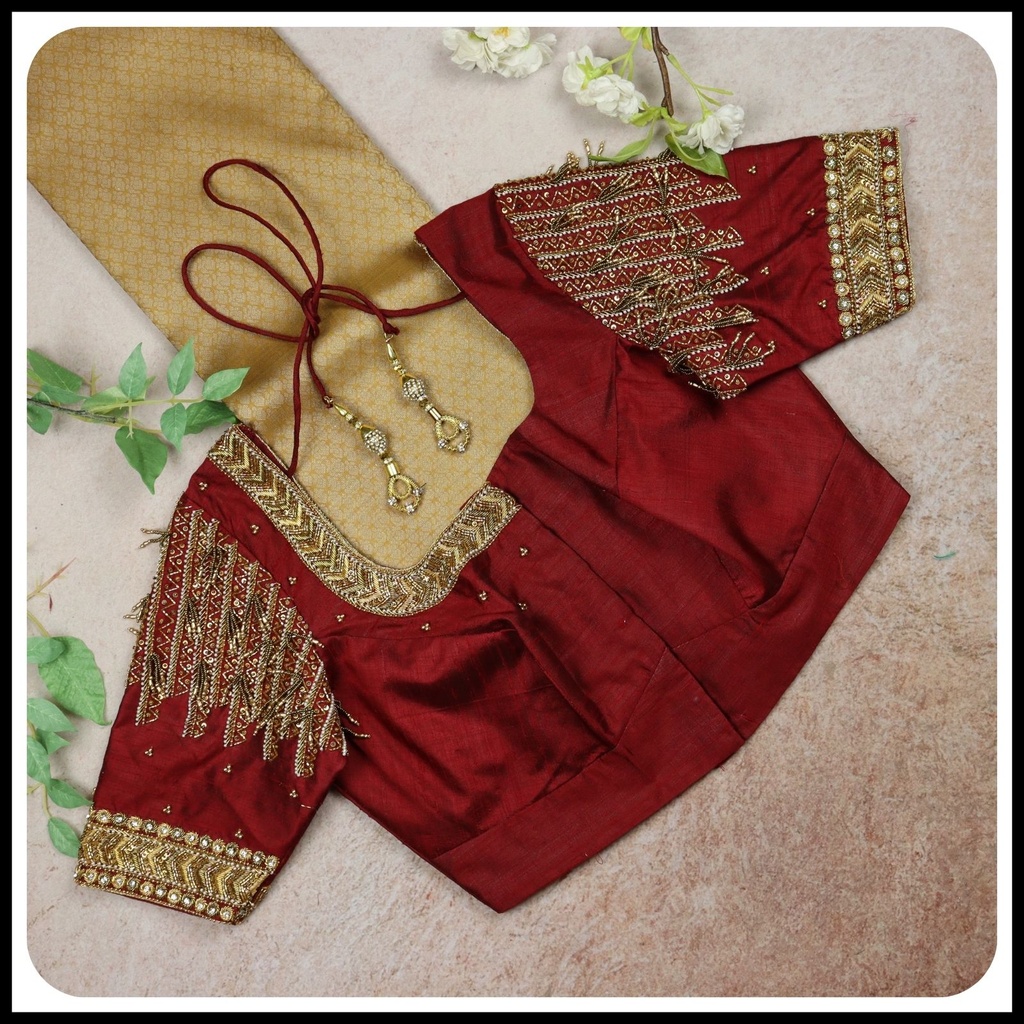 maroon line and zig zag design with bead hangings Stitching