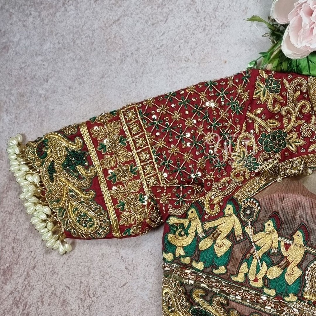 maroon palanquin floral with peacock design Stitching