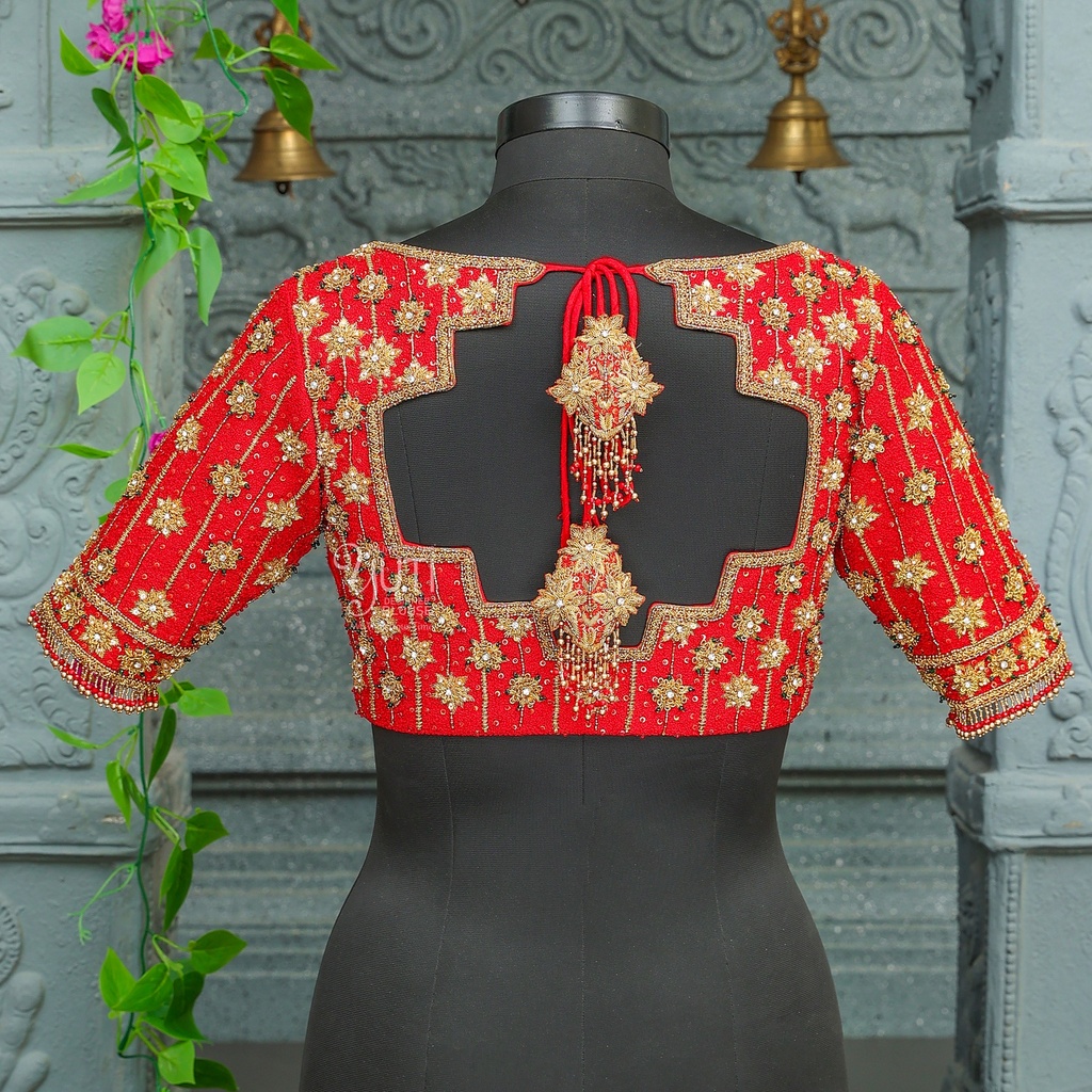 open neck traditional Red blouse adorned with exquisite golden embroidery Stitching