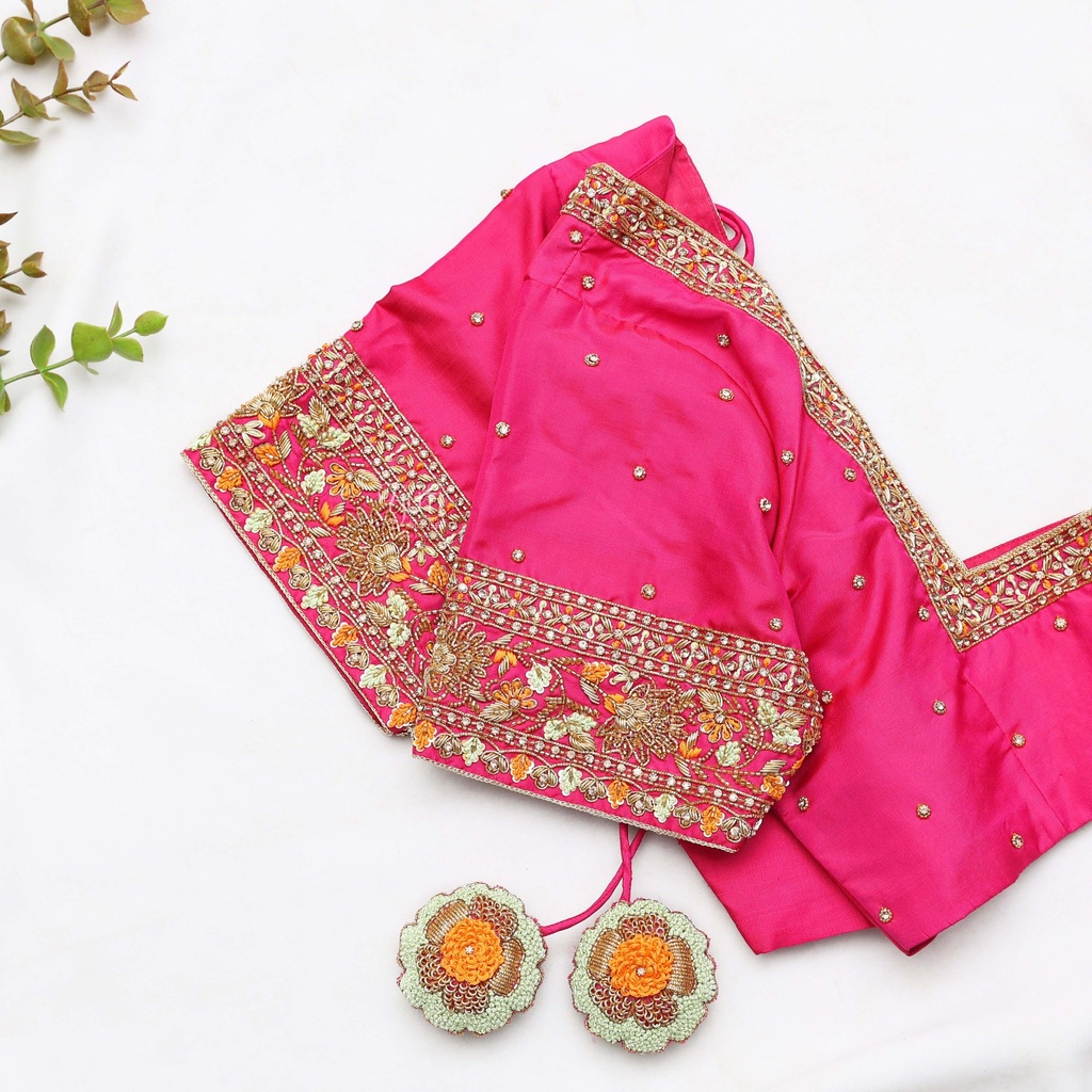traditional Indian attire with this stunning pink embroidered Blouse Stitching