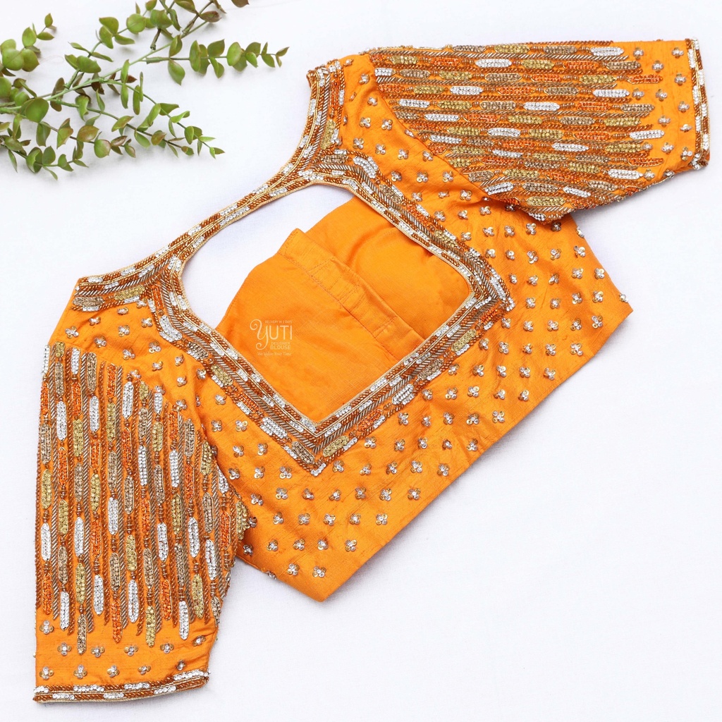 yellow blouse with a matching neck and embroidery design Stitching