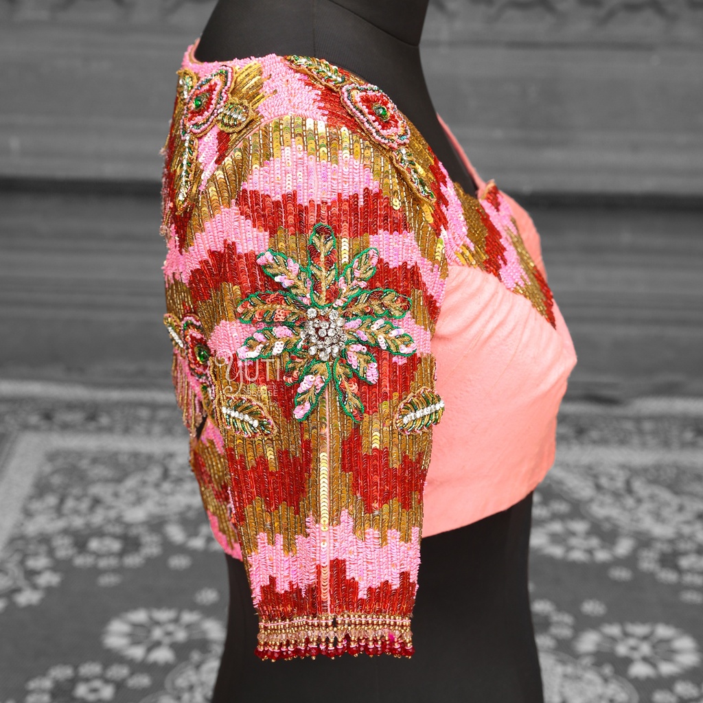 Pink and Red bridal blouse with a beautiful flower pattern. Stitching