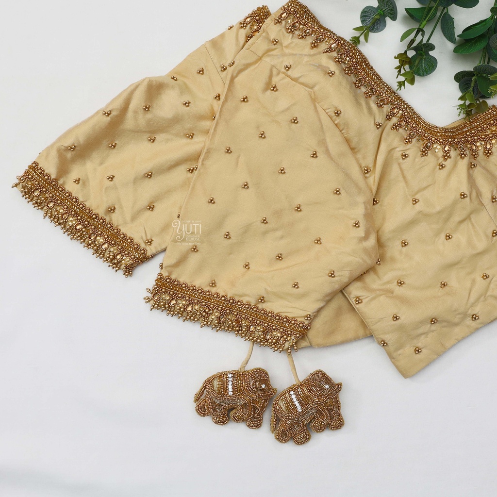 Radiant and regal light brown Aari Bridal Blouse: