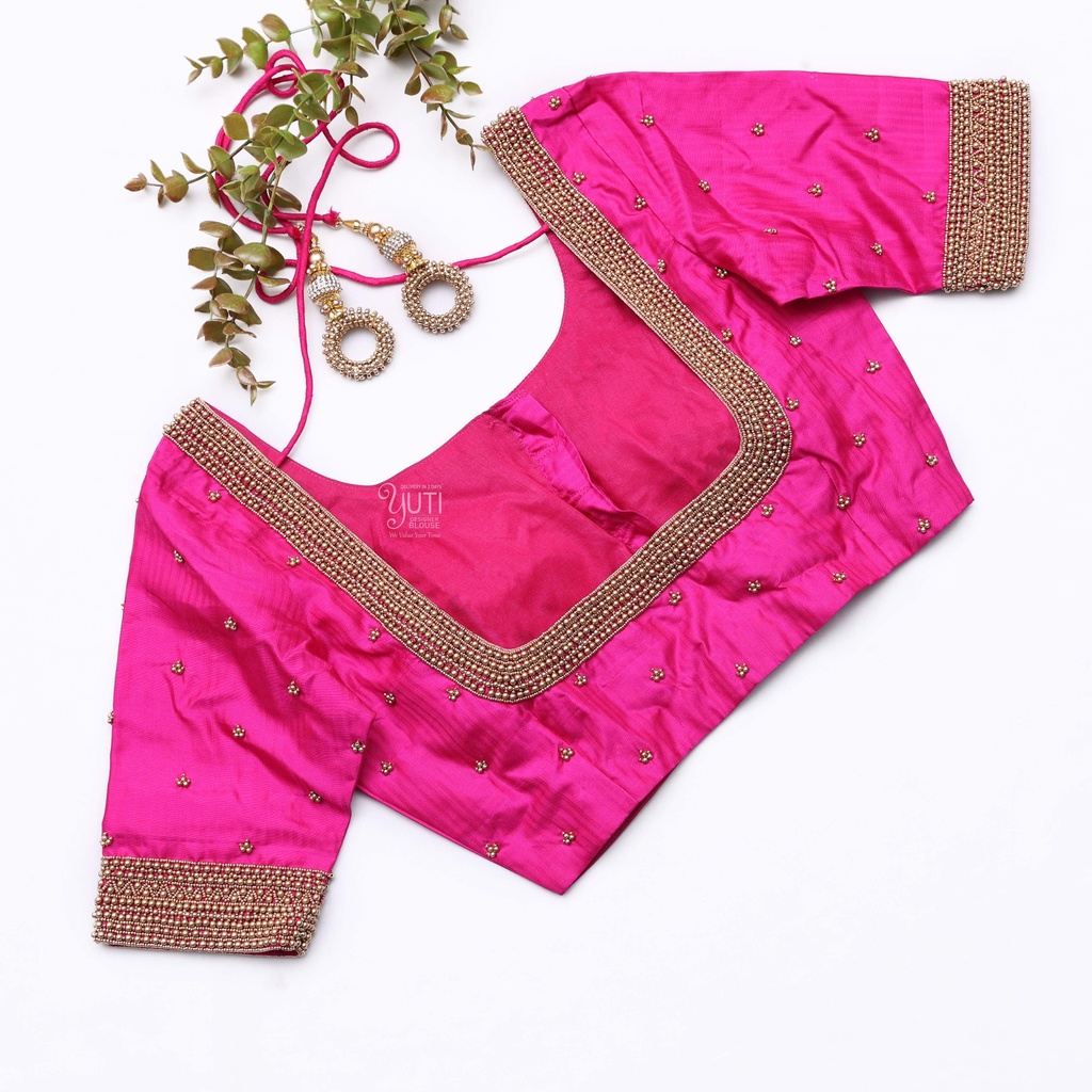 Stunning pink blouse with its exquisite gold embroidery