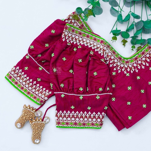 "Feeling powerful and stylish in my new purple red aari work blouse! Stitching