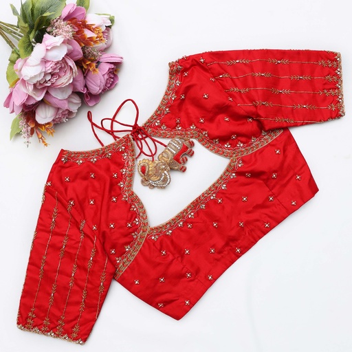 A stunning blend of red and gold, this bridal blouse Stitching