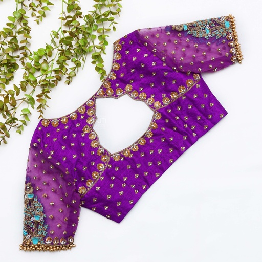 A touch of royalty in this magenta bridal blouse Stitching