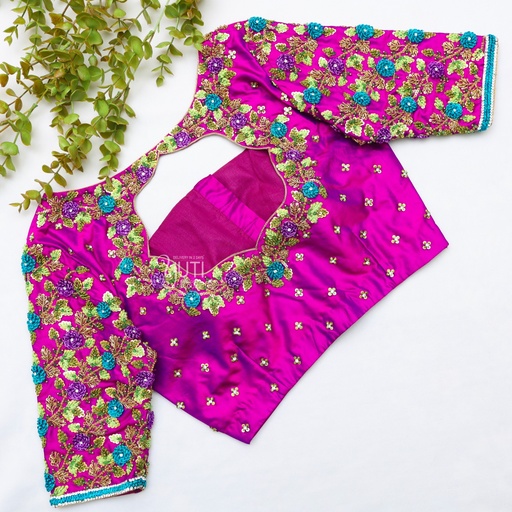 Beauty of pink color with green & yellow embroidery on bridal blouses Stitching
