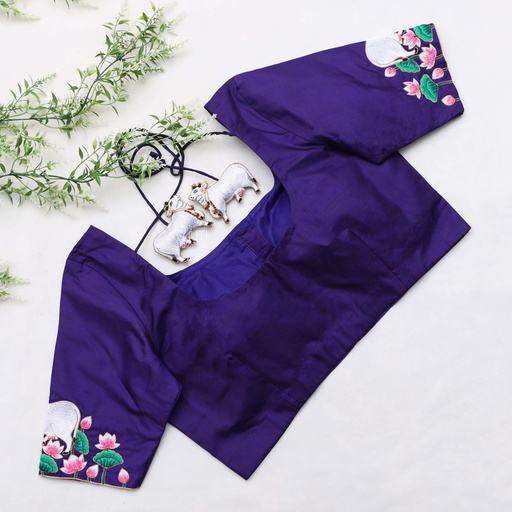 Dark blue bridal blouses featuring stunning cow hand embroidery design. Stitching