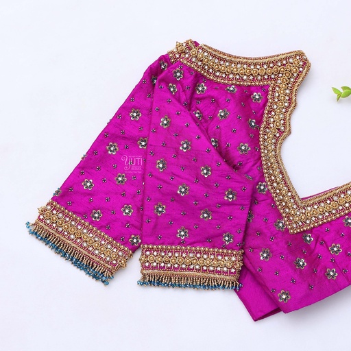 Elevate your bridal attire with our exquisite Purple Embroidery bridal blouse Stitching