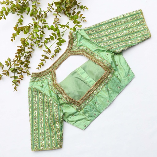 Elevate your bridal look with our stunning Beryl Green Designer Blouse Stitching