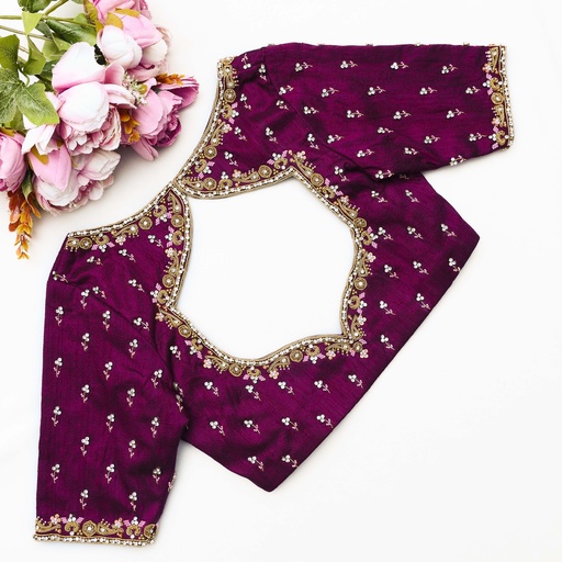 Embrace elegance and grace with this stunning purple blouse Stitching