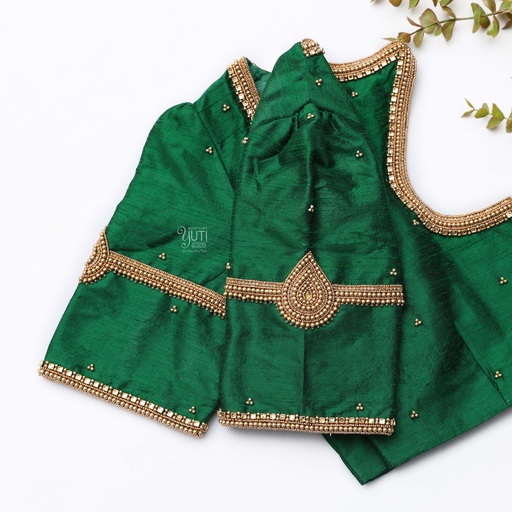 Embrace the elegance of this stunning green blouse Stitching