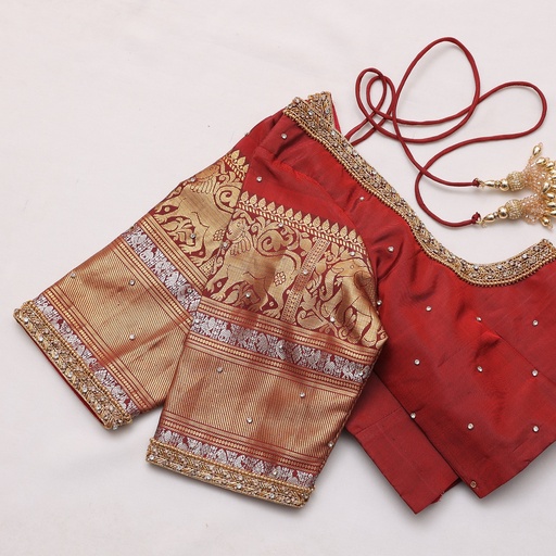 Introducing our stunning Falu Red embroidery blouse, perfect for adding a pop of color to your wardrobe this season.