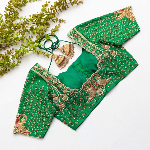 Feeling like a natural goddess in this stunning green bridal blouse Stitching