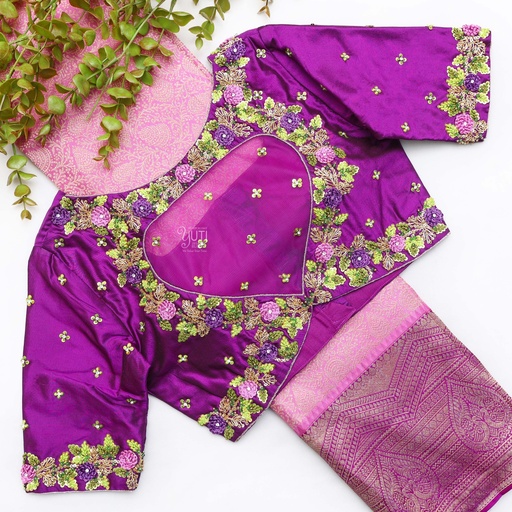 Flaunting the vibrant colors of spring with this purple blouse and its floral design. Stitching