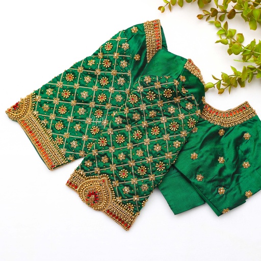 Indulge in the rich beauty of our Dark Green embroidery blouse. Stitching