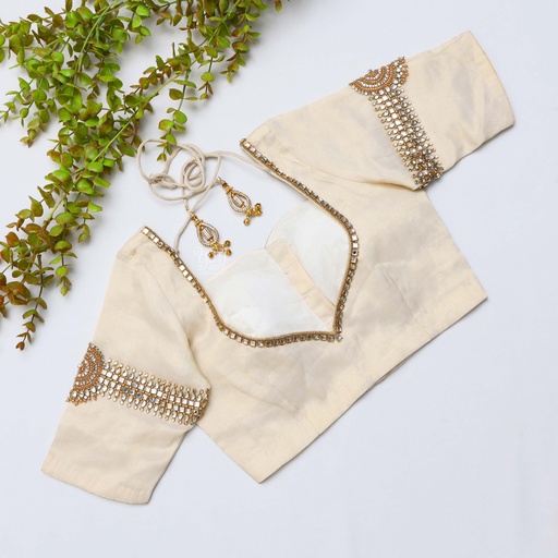 Intricately embroidered blouses in beautiful sandel hues. Stitching