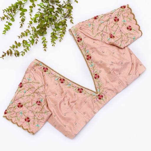 Just finished sewing the embroidery blouse with a unique pattern. Stitching