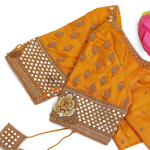 Orange blouse with lakshmi pendant Stitching