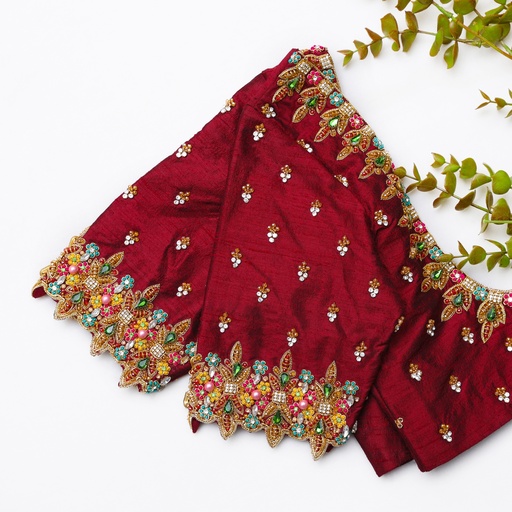 Step into elegance with this stunning red color embroidery bridal blouse! Stitching