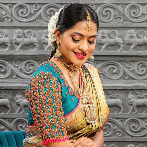 The allure of blue embroidery on bridal blouse Stitching