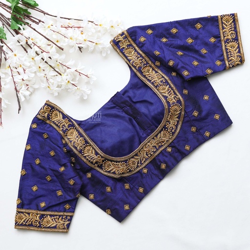 The perfect dark blue bridal blouse with stunning golden embroidery work Stitching